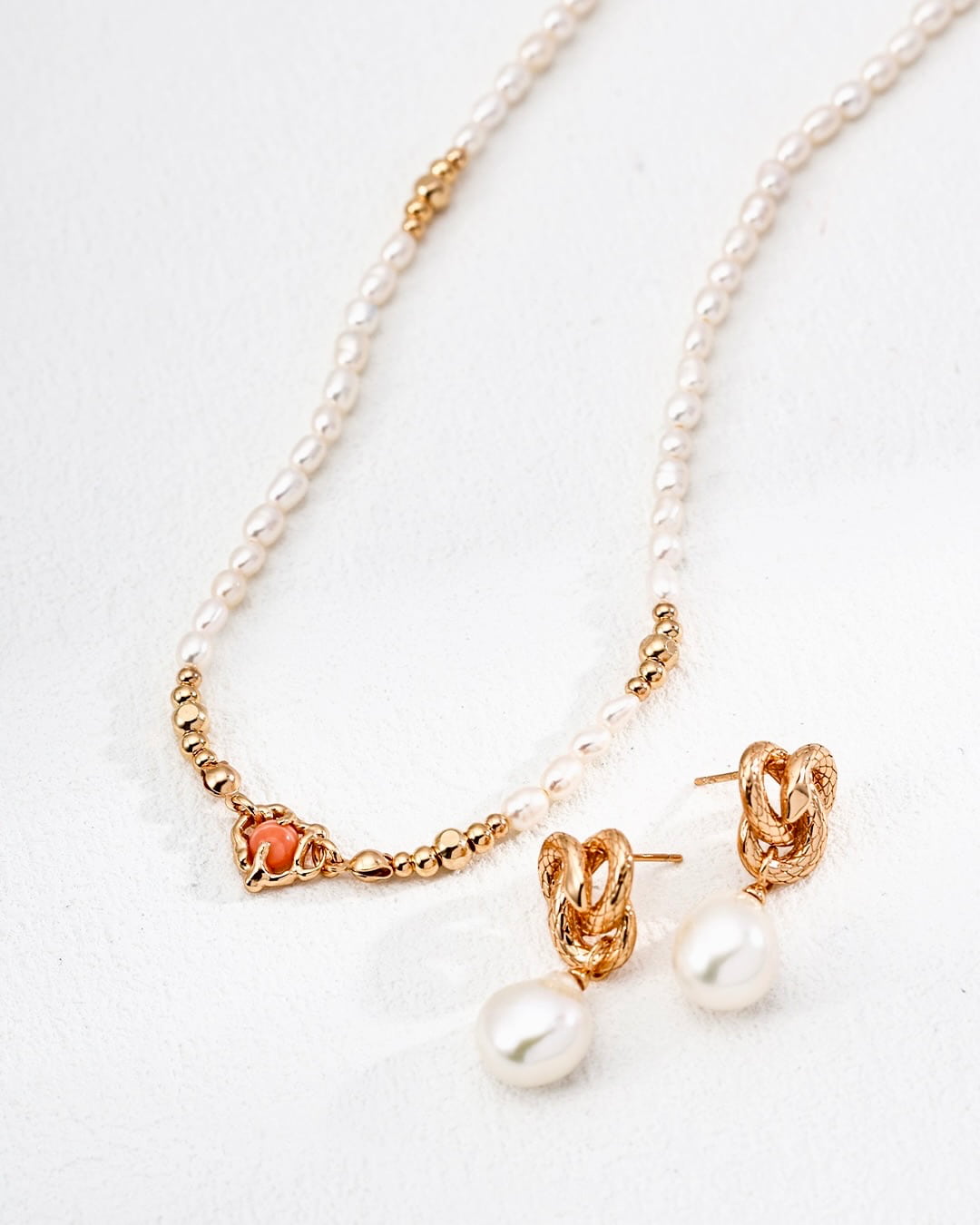 Serpentine Baroque Pearl Earrings | Sculptural Mystery in Vintage Gold